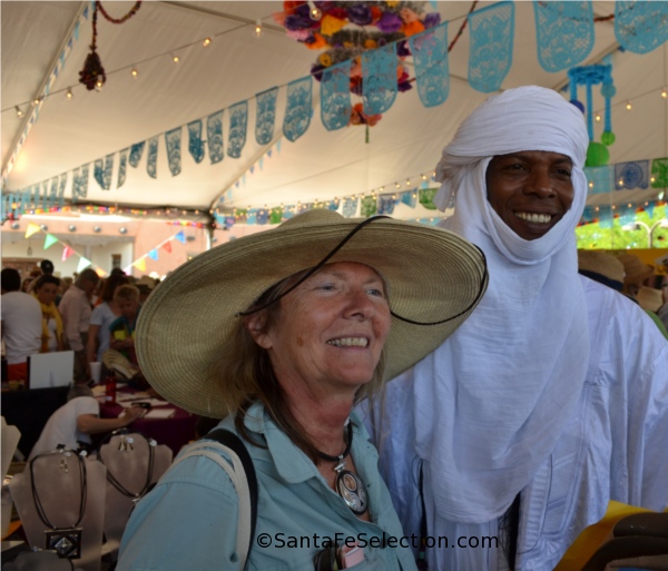 http://santafeselection.com/blog/wp-content/uploads/2014/01/tuaregfolkartistandfan.jpg