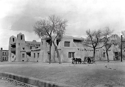 Wood vendor outside the N.M Museum of Fine Arts, c 1920. P.O.G photo archives, NM History Mus.