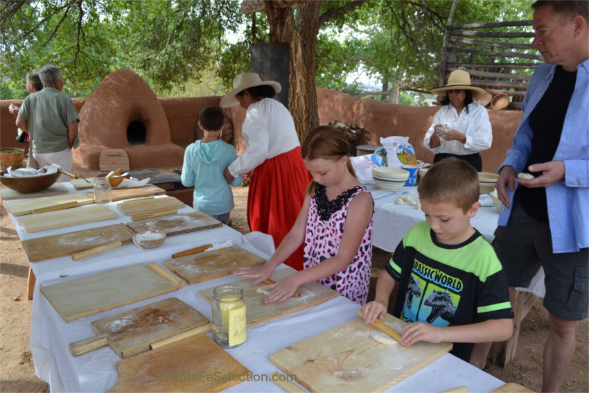 Kids having fun making tortillas to cook in the horno ovens. Delicioso!